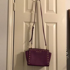 Michael Kors studded Selma crossbody bag.